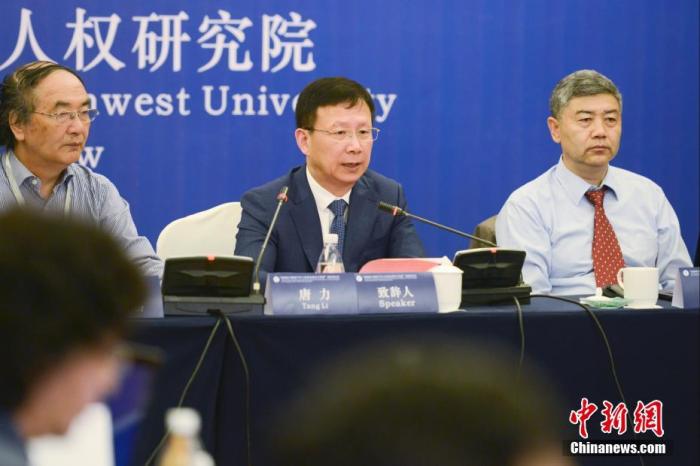 圖為西南政法大學(xué)副校長、教授唐力(右二)發(fā)言。 <a target='_blank' ></p><p  align=
