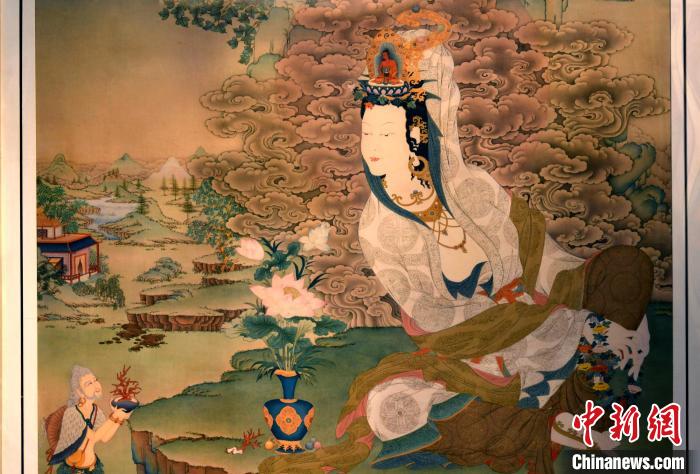 圖為5月16日，展覽中新創(chuàng)唐卡作品《靜息觀音》(局部)。　李林 攝